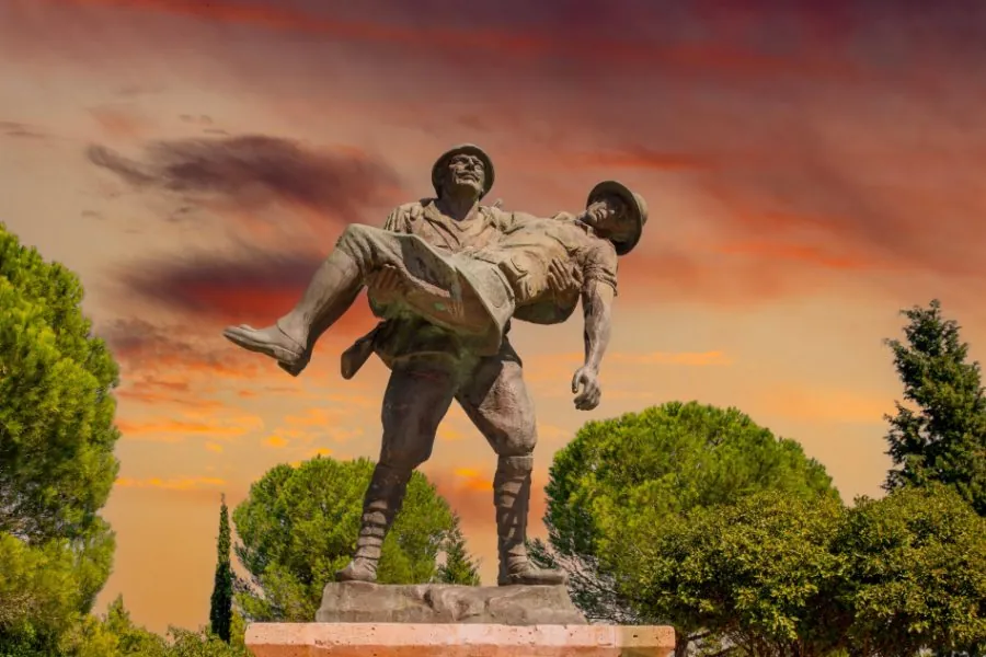 Turkish soldier carrying an Anzac soldier during Gallipoli Campaign, Turkey