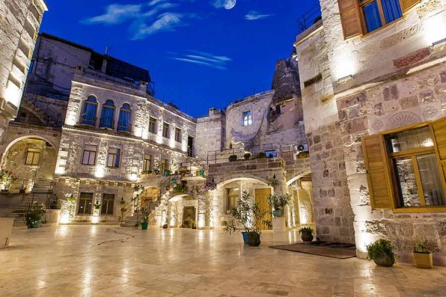 Exterior view of Imperial Cave Suite Hotel in Cappadocia featuring unique cave rooms and stunning natural surroundings.